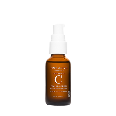 One Love Organics Botanical C Facial Serum in an amber glass bottle with a white pump dispenser