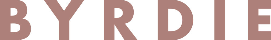 BYRDIE logo in gray on a black background