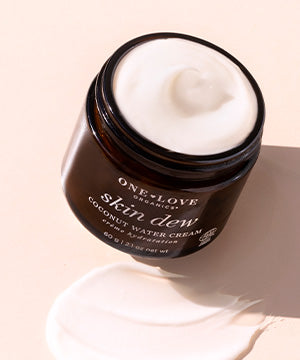 An open jar of skin dew coconut water cream 
