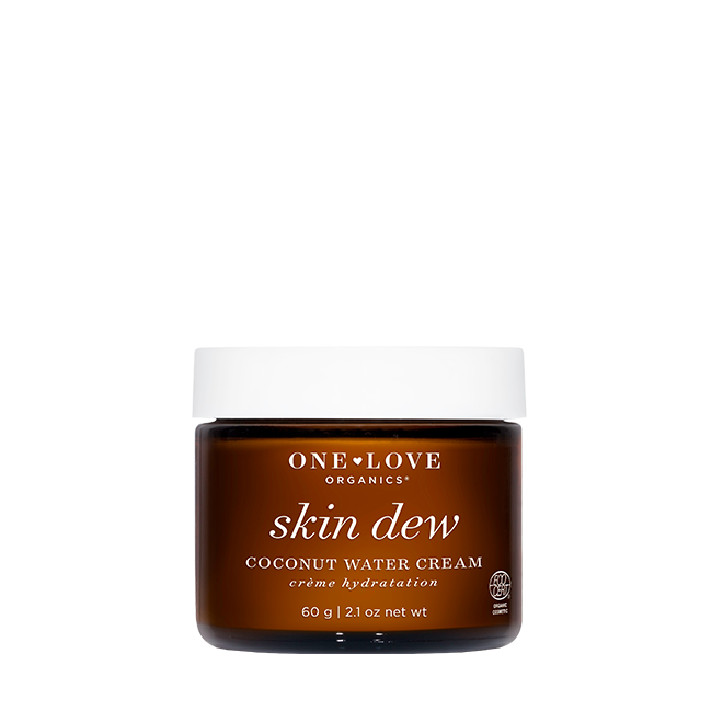 One Love Organics Skin Dew Coconut Water Cream in a dark amber brown jar with a white lid, centered on a plain white background.