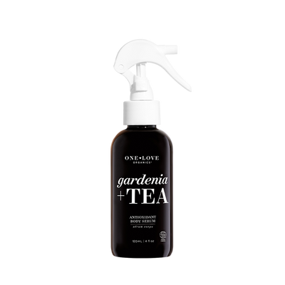 A 120ml spray bottle of One+Love Botanicals Gardenia + Tea Antioxidant Body Serum