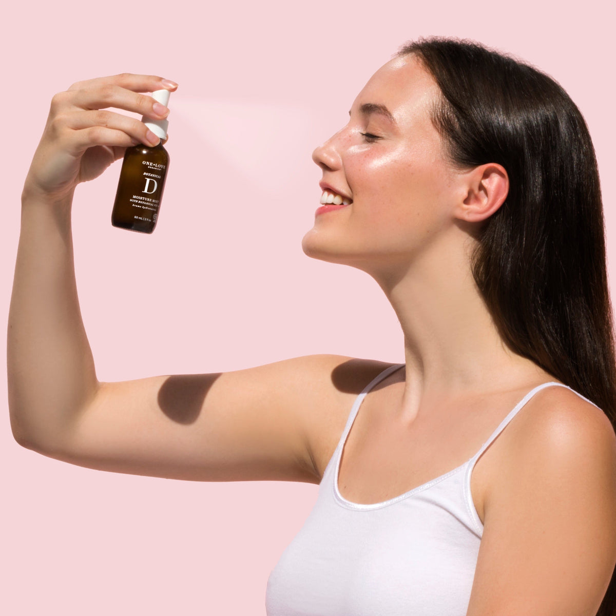 botanical d moisture mist being sprayed